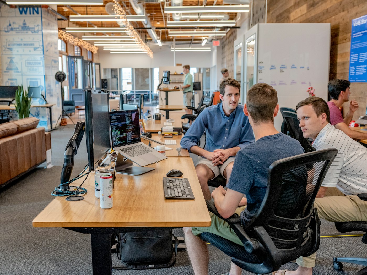 A hiring team reviewing candidates together